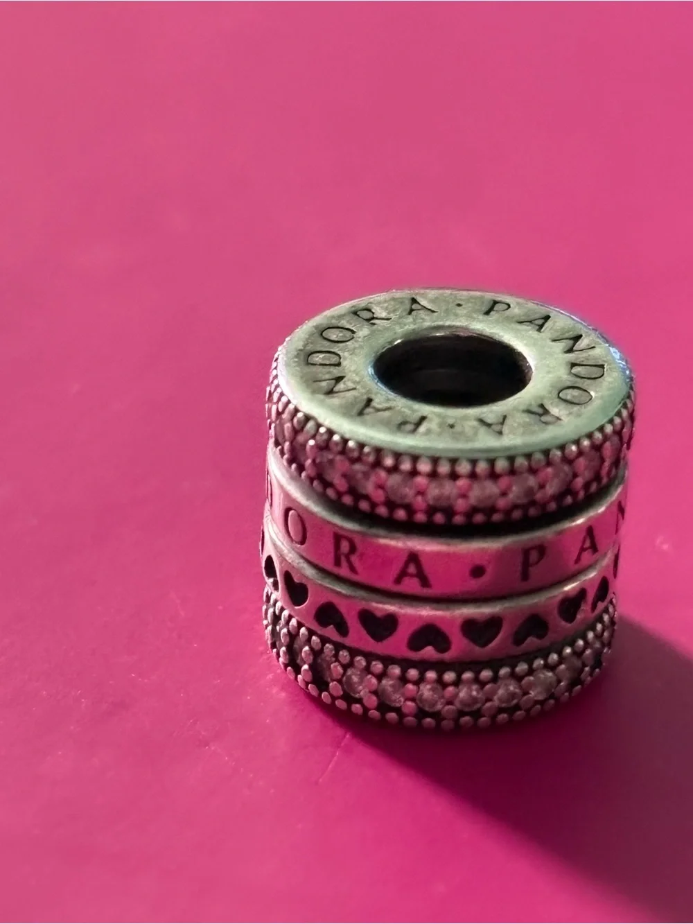 Pandora Sterling Silver Stacked Heart Spacer Charm - Pink Background